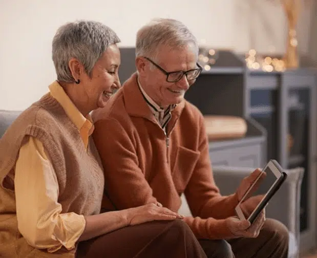 Man and woman looking at computer