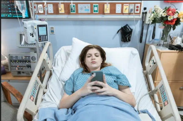 Woman in hospital bed